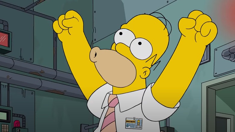 Homer Simpson berteriak woo-hoo dengan tangan terangkat