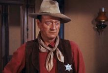 John Wayne sebagai John T. Kesempatan yang terlihat khusyuk di Rio Bravo