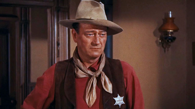John Wayne sebagai John T. Kesempatan yang terlihat khusyuk di Rio Bravo