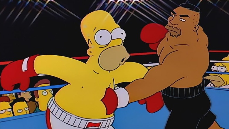 Homer ditinju di perut oleh drederick tatum di simpsons