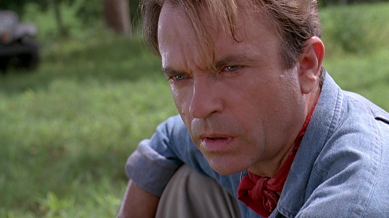 Alan Grant dari Sam Neill menatap dengan takjub di Jurassic Park