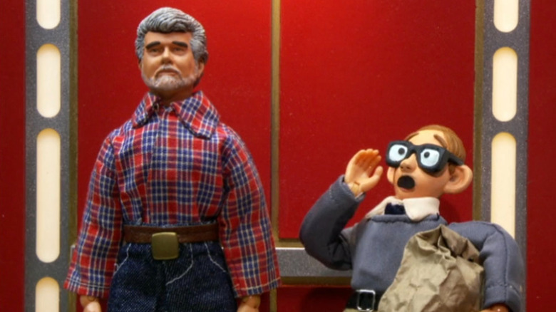 George Lucas dan kutu buku di lift dengan ayam robot