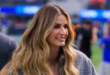 Erin Andrews tersenyum