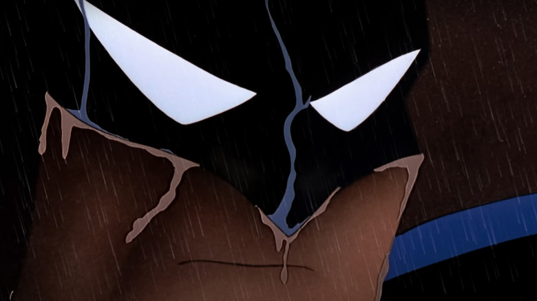 Closeup menunjukkan mata Batman di belakang cowl -nya di Batman: The Animated Series