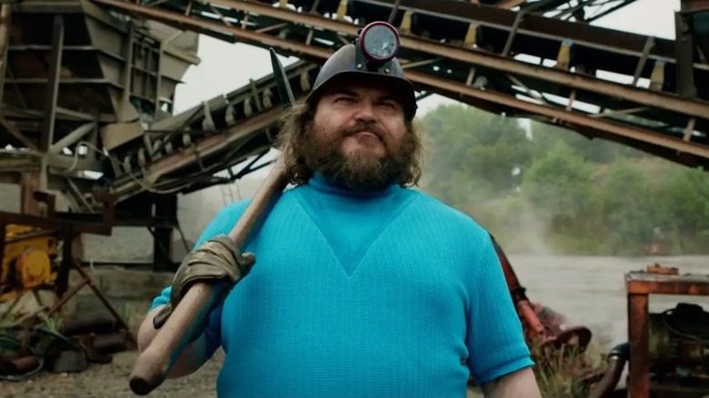 Jack Black seperti Steve, memegang kapak