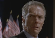Clint Eastwood terhubung dan khawatir sebagai Frank Horrigan di dalam garis api