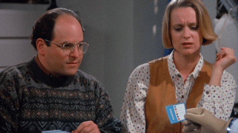 George dan pacarnya bermain sepele di Seinfeld.