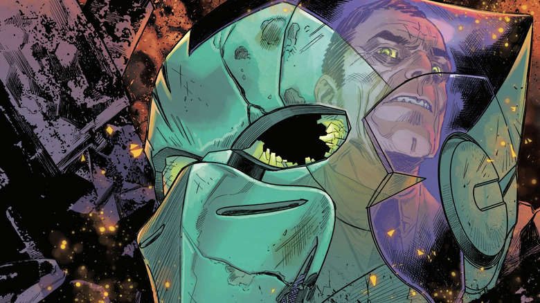 Topeng goblin hijau yang hancur dengan refleksi Norman Osborn tentang sampul Ultimate Spider-Man #17