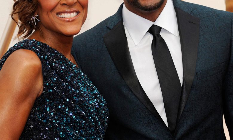 Michael Strahan dan Robin Roberts di upacara Oscar Academy Awards Tahunan ke -92
