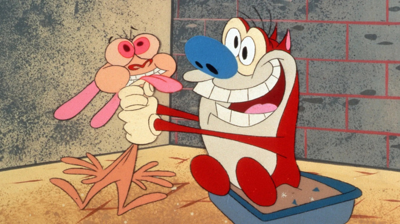 Stimpy meremas leher Ren dengan gembira di acara Ren & Stimpy.