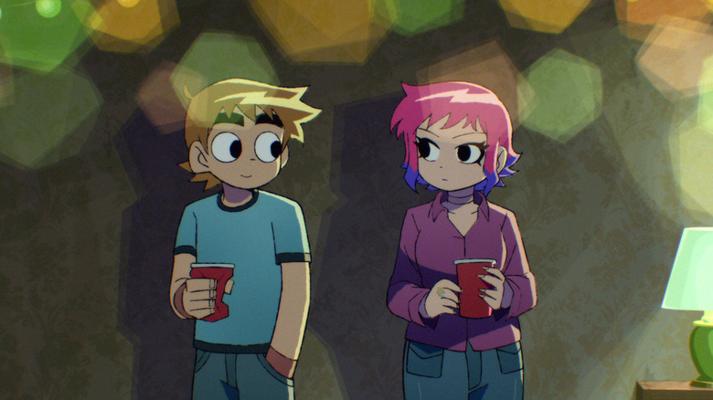 Scott dan Ramona saling memandang di sebuah pesta di Scott Pilgrim lepas landas