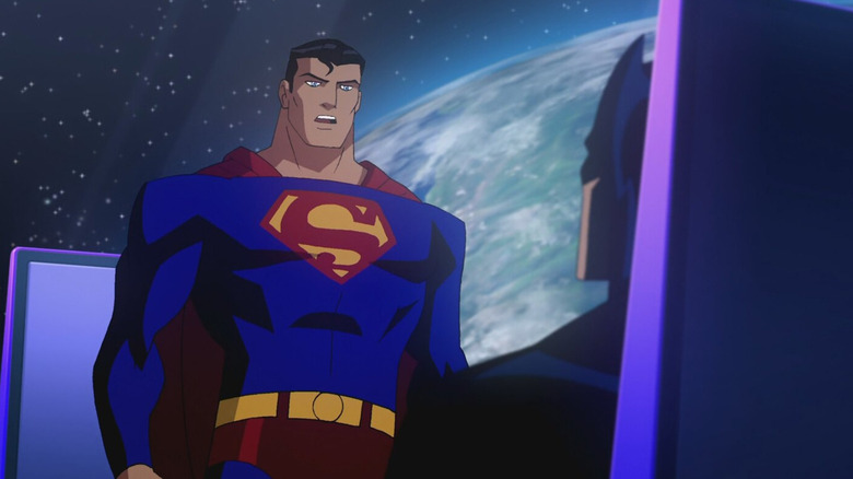 Superman berbicara dengan Batman.