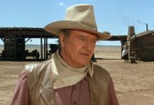 John Wayne lapuk dan ditandai sebagai Wil Anderson di Cowboys
